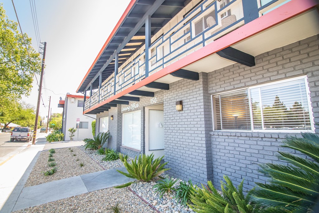 Woodland Village exterior with pristine landscaping at Woodland Village Apartments , Woodland, CA
