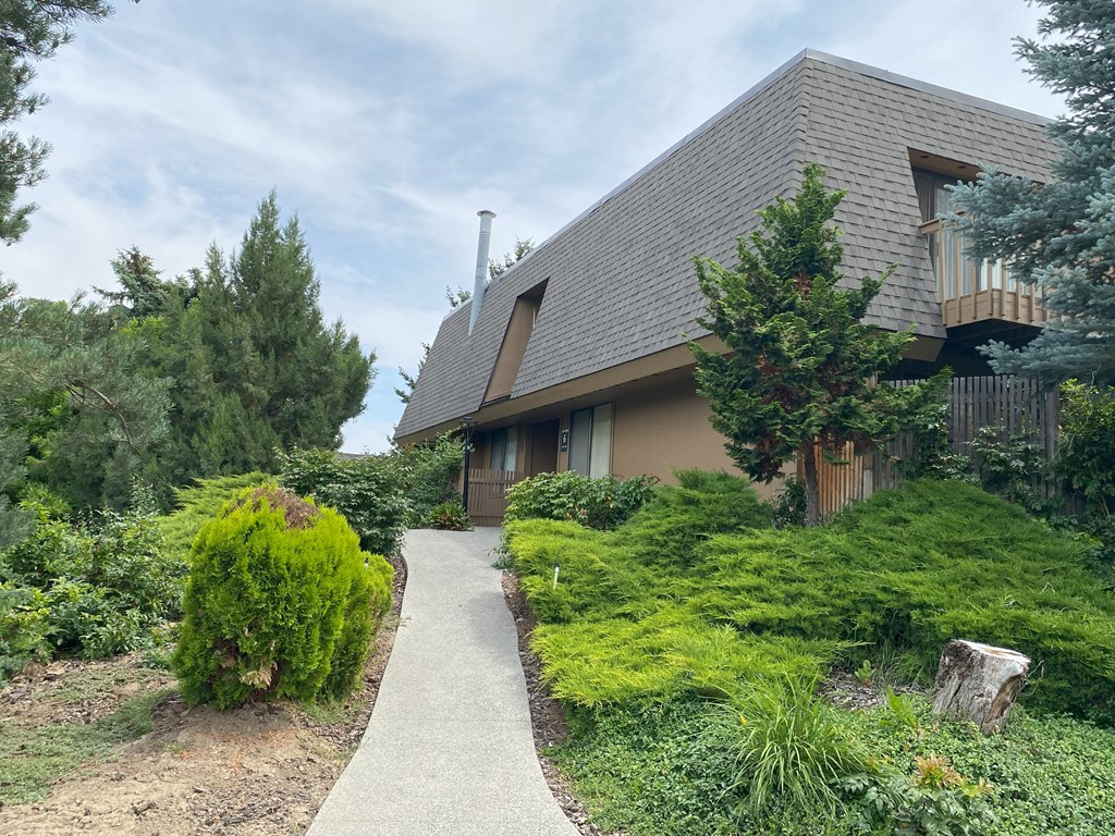 a house with a walkway in front of it at Castlerock, Wenatchee, WA