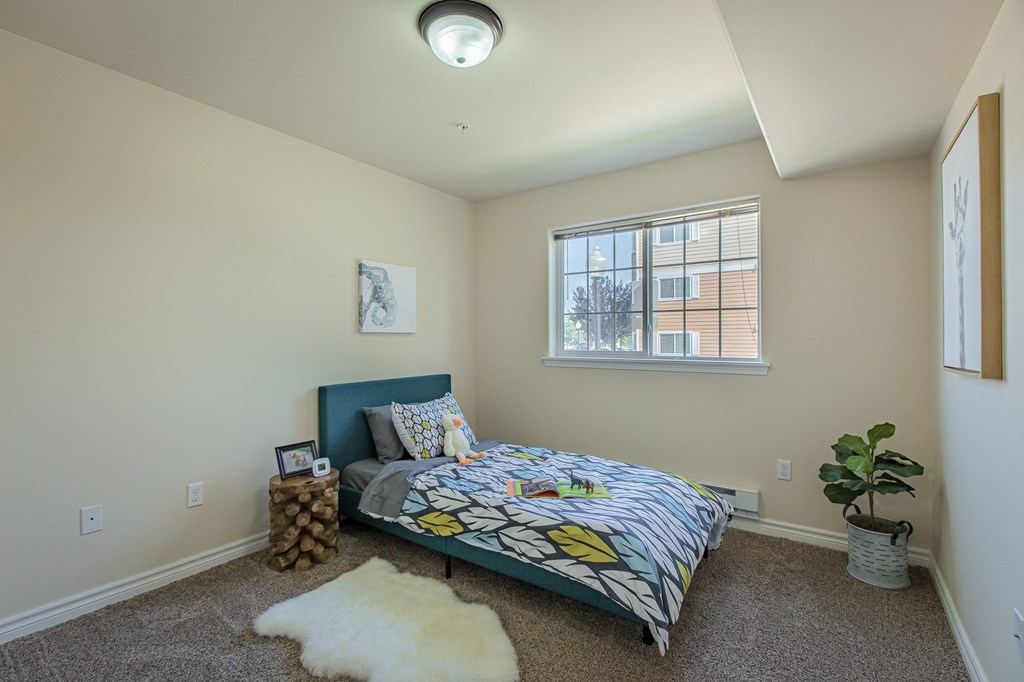 a bedroom with a bed and a window  at Quail Springs, Washington, 99353