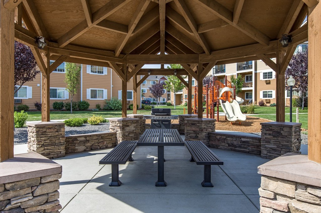 an open pavilion with benches and a picnic table  at Quail Springs, Washington, 99353