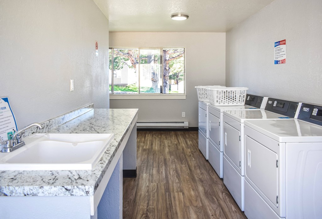 Community laundry room with washer and dryers at Kirkwood Meadows in Pocatello, ID
