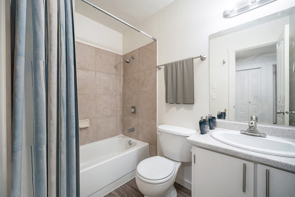 a bathroom with a toilet sink and bathtub at Kirkwood Meadows, Pocatello, ID