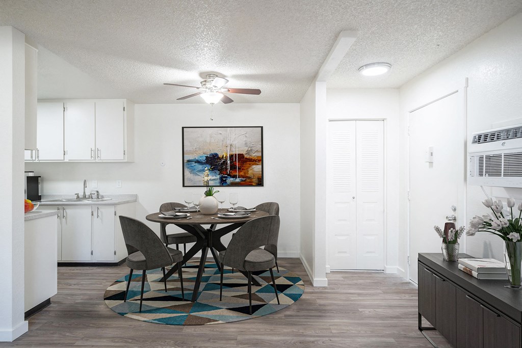 a dining area with a round table and four chairs at Kirkwood Meadows, Pocatello, ID 83201