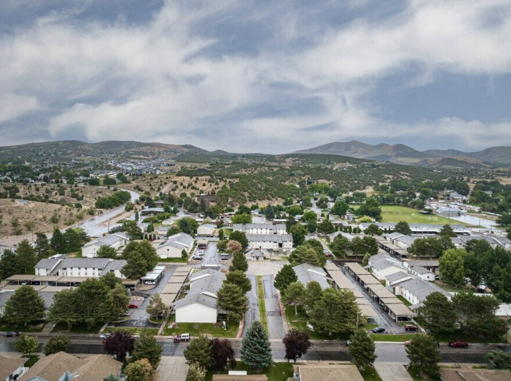 an aerial view of a neighborhood with houses and trees an aerial view of a neighborhood with houses and trees at Kirkwood Meadows, Pocatello, ID 83201