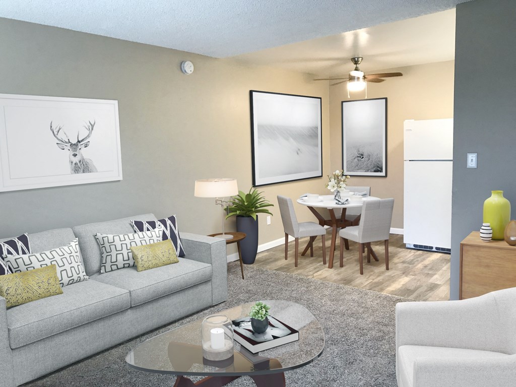 a living room and dining room with a couch and a table at Woodland Crossing , Woodland