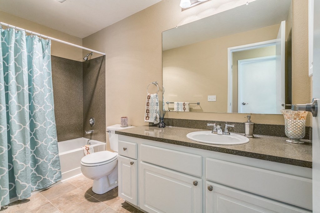 a bathroom with a sink toilet and a shower at Springfield, Renton, 98055 
