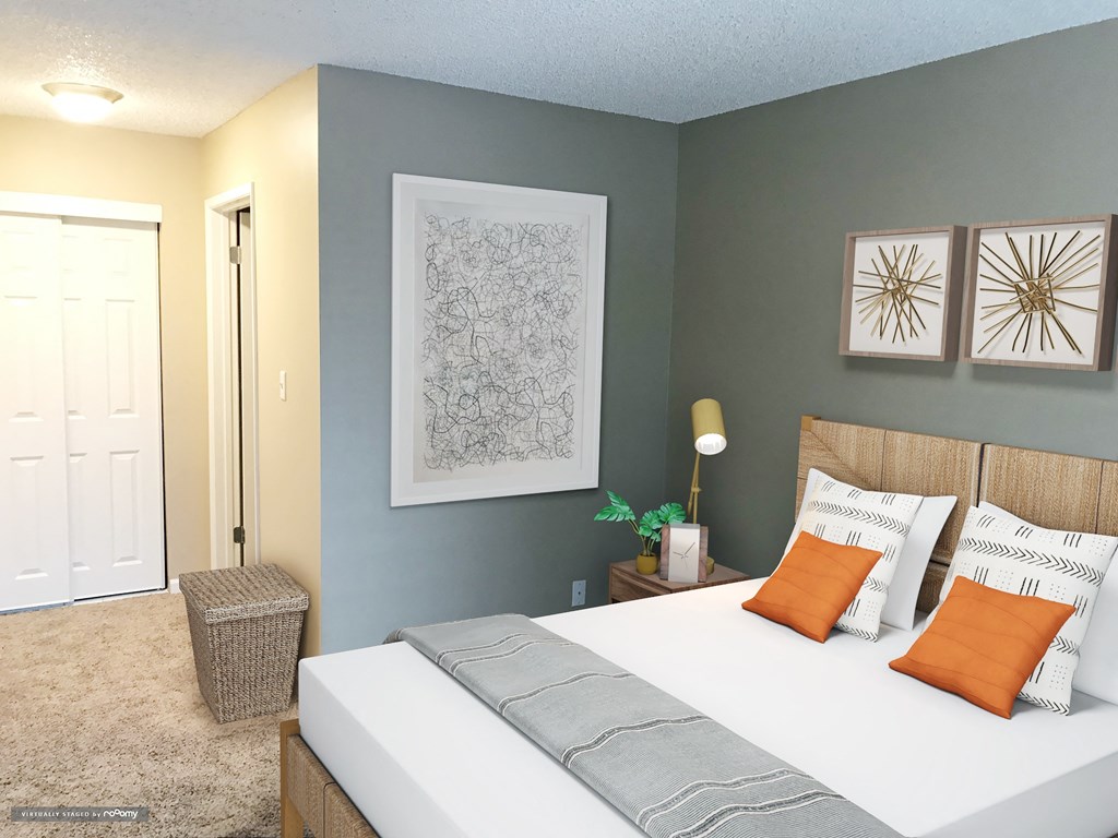 a bedroom with a white bed and two pictures on the wall at Woodland Crossing , California