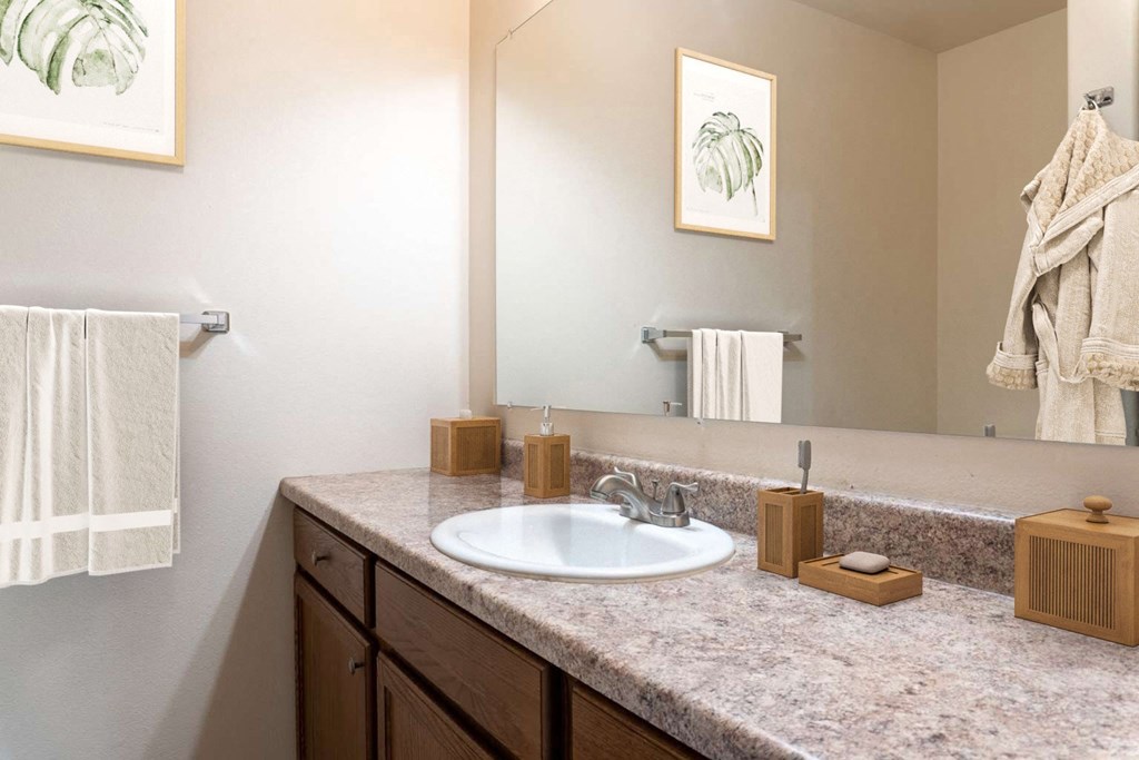 Bathroom with dark cabinets at Pine Tree Park, Kennewick