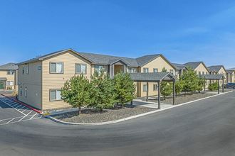 a row of houses with a parking lot