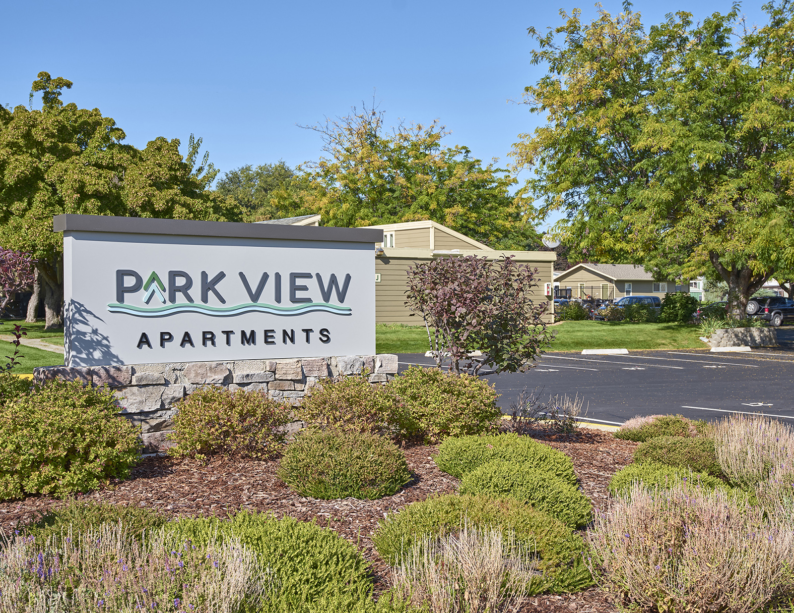Property sign in well landscaped area.at Park View Apartments, Washington, 98801