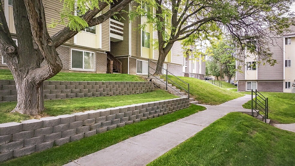 a sidewalk in front of a row of houses  at Summit, Pocatello, Idaho
