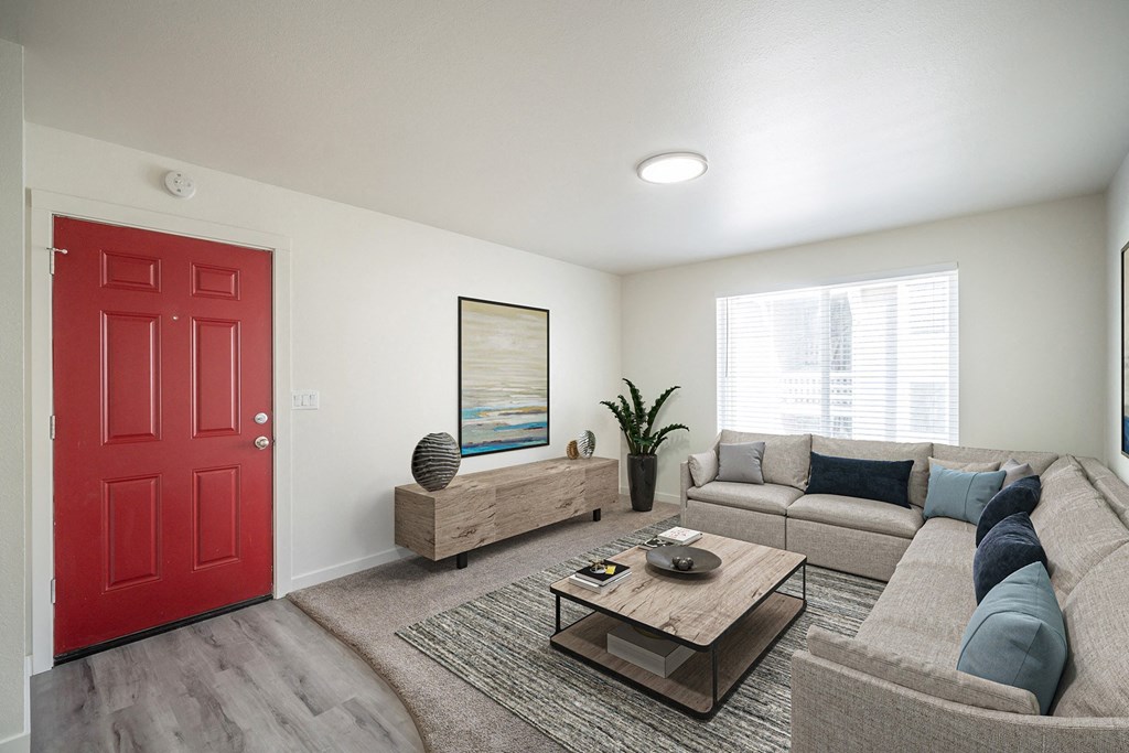 a living room with a red door at Summit, Pocatello