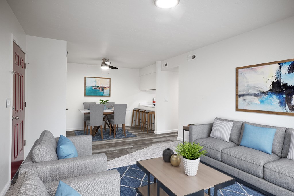 a living room with couches and a table