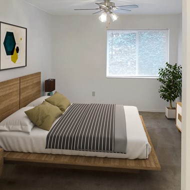 Carpeted bedroom with a large window and ceiling fan. Staged with a bed, dresser, side table, and house plant.