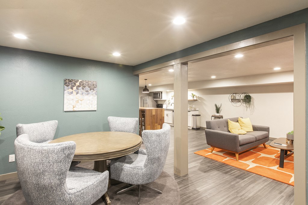 Updated lounge with game table, couch and kitchen.at Cedarwood, Wenatchee, WA 98801