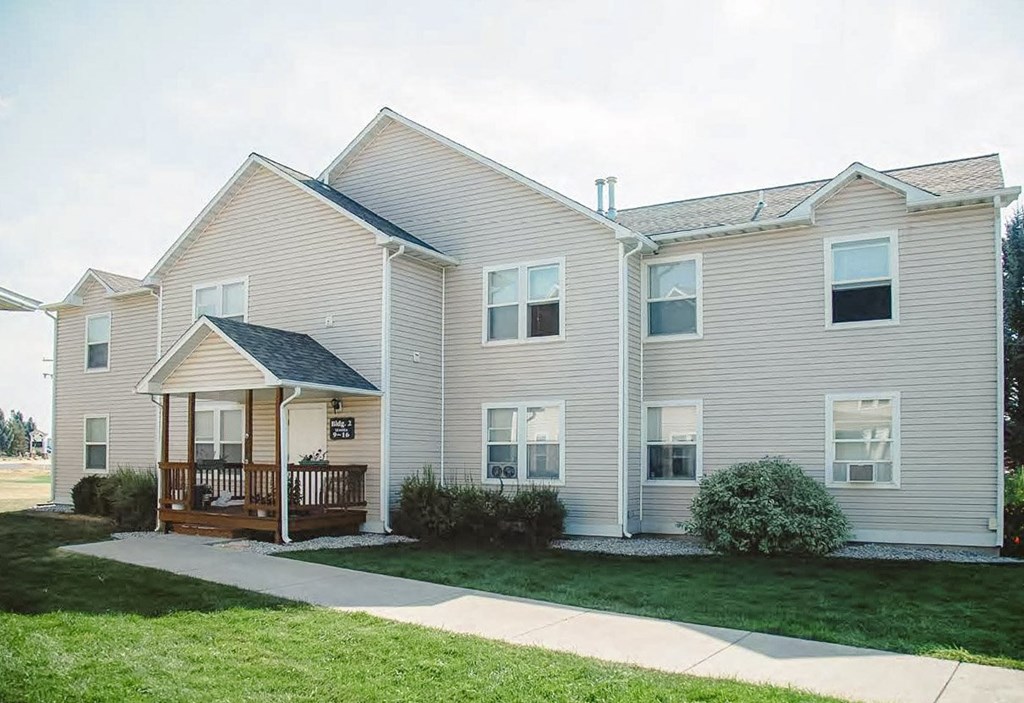 A two-story house with a front porch.