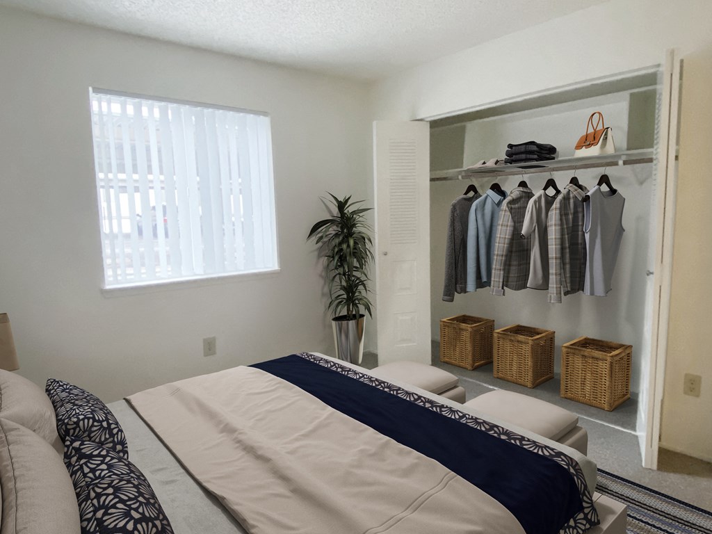 Bedroom with huge shutter door closet with a closet rod and storage shelf.at Kirkwood Meadows, Idaho, 83201