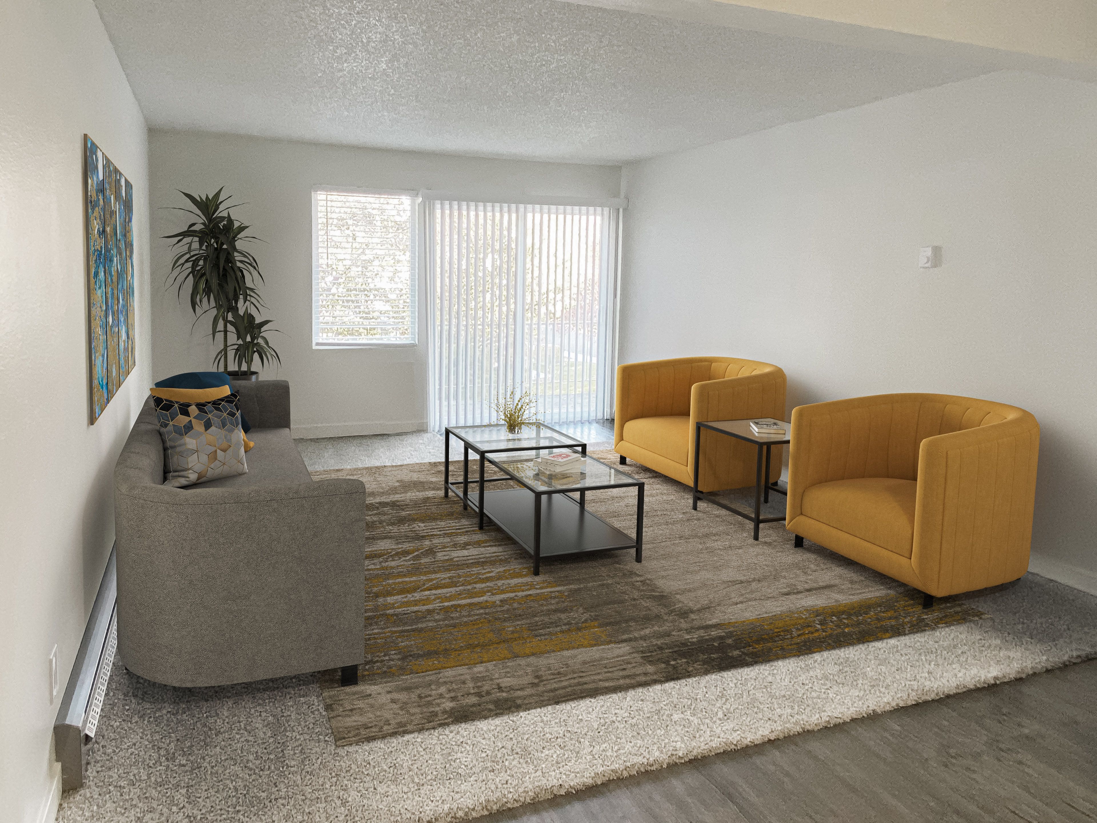 Carpeted living room, large window, sliding glass doors to balcony on back wall, staged with 2 orange chairs, couch, coffee table.at Laurel Park, Twin Falls, ID