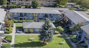 Exterior Exterior with an aerial view of the complex and the interior grassy courtyard. - Photo Gallery 4