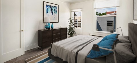 a bedroom with a bed and a dresser