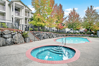Small outdoor pool with red trim at Sunrise Lane Apartments Everett WA