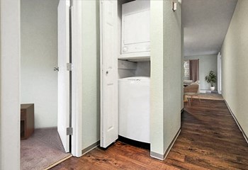 Stacked Washer and Dryer in hall closet. - Photo Gallery 3