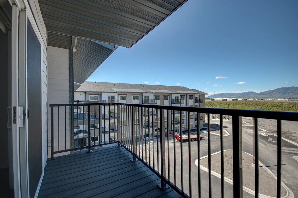 3-Bedroom Balcony at Yellowstone Landing Apartments in Belgrade, MT