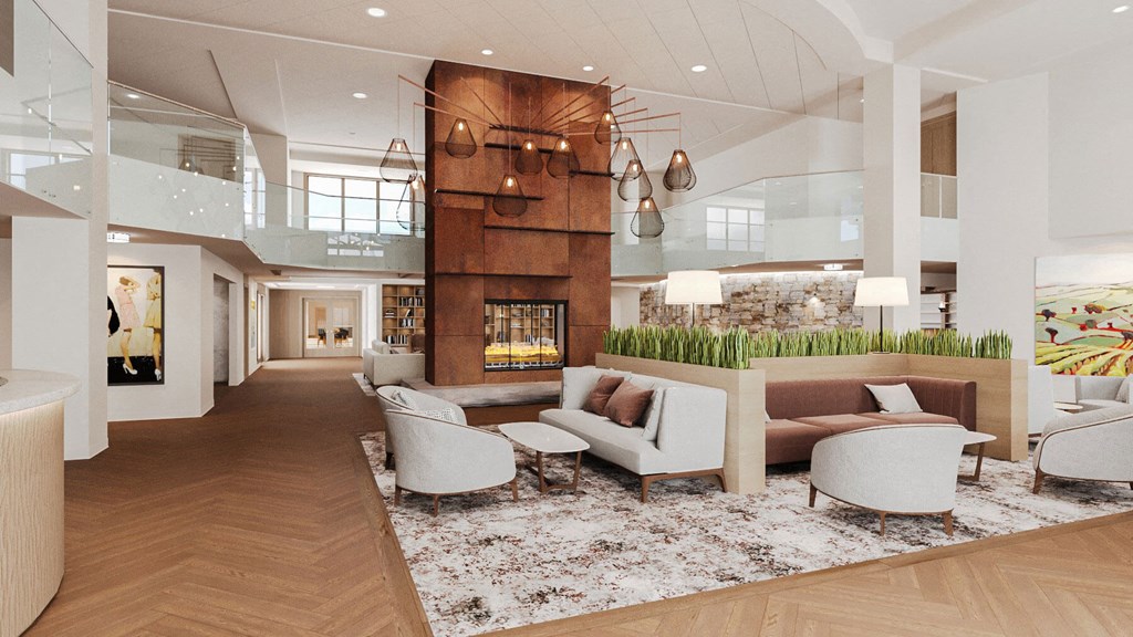 a rendering of a lobby with couches and chairs and a fireplace at Hearthstone Lodge Senior Residences, Auburn, CA 95602