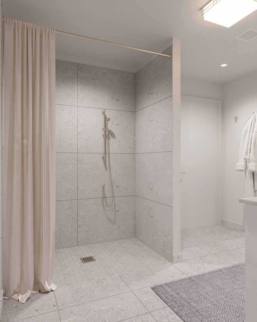 a bathroom with a shower and a shower curtain at Hearthstone Lodge Senior Residences, California