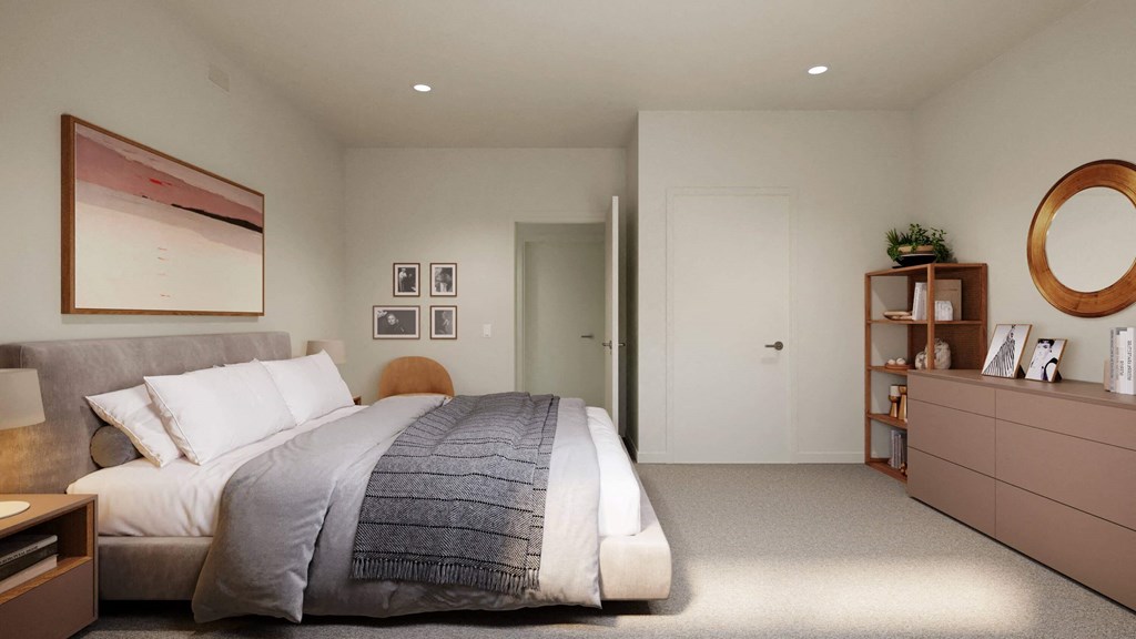 a bedroom with a bed and a dresser and a door to a bathroom at Hearthstone Lodge Senior Residences, California, 95602