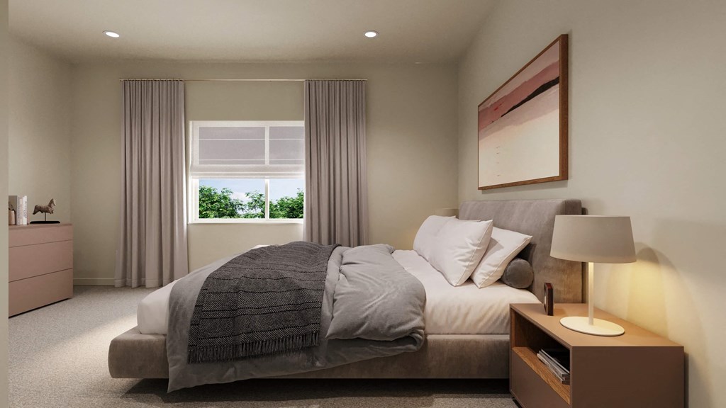 the master bedroom has a large bed and a large window at Hearthstone Lodge Senior Residences, California