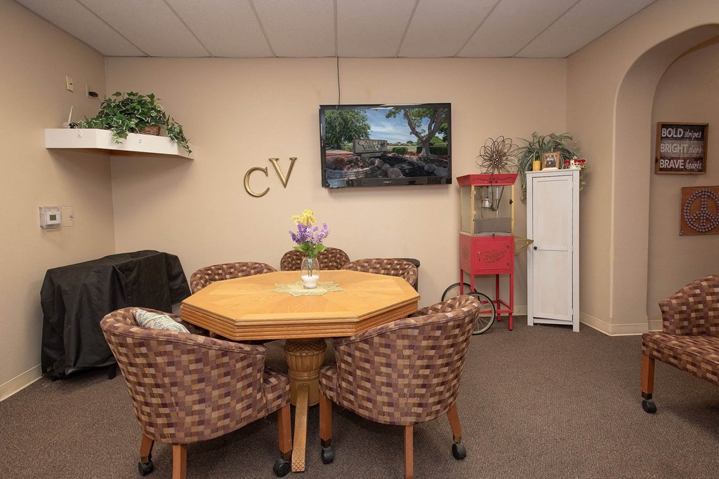 a dining room with a table and chairs at Castle Vista Senior Duplex Community, Atwater, CA, 95301