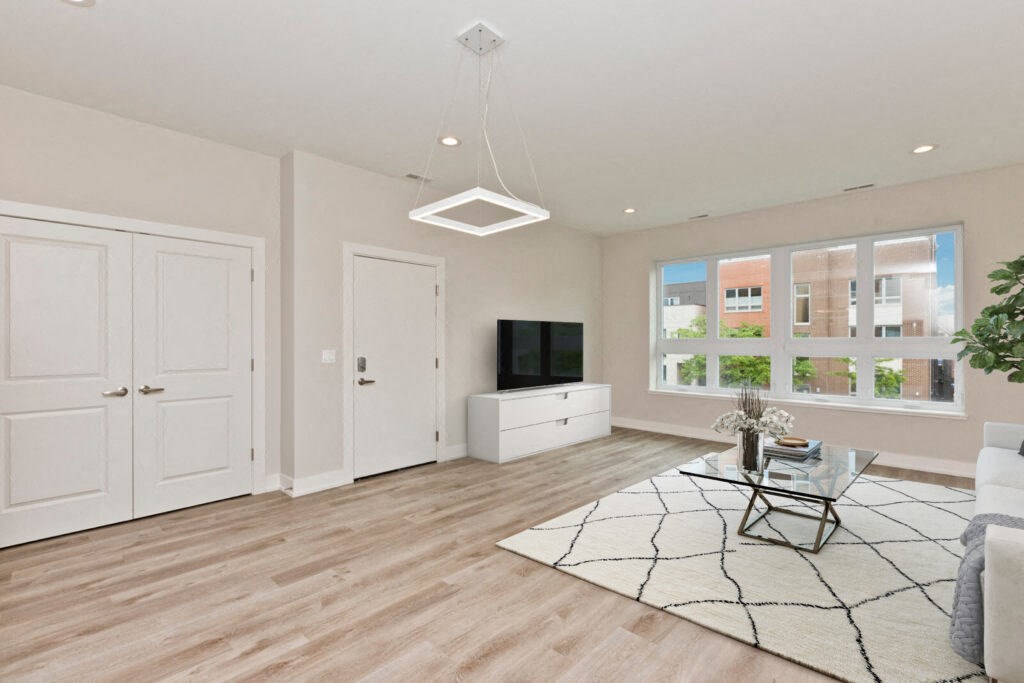 a living room with a couch and a tv