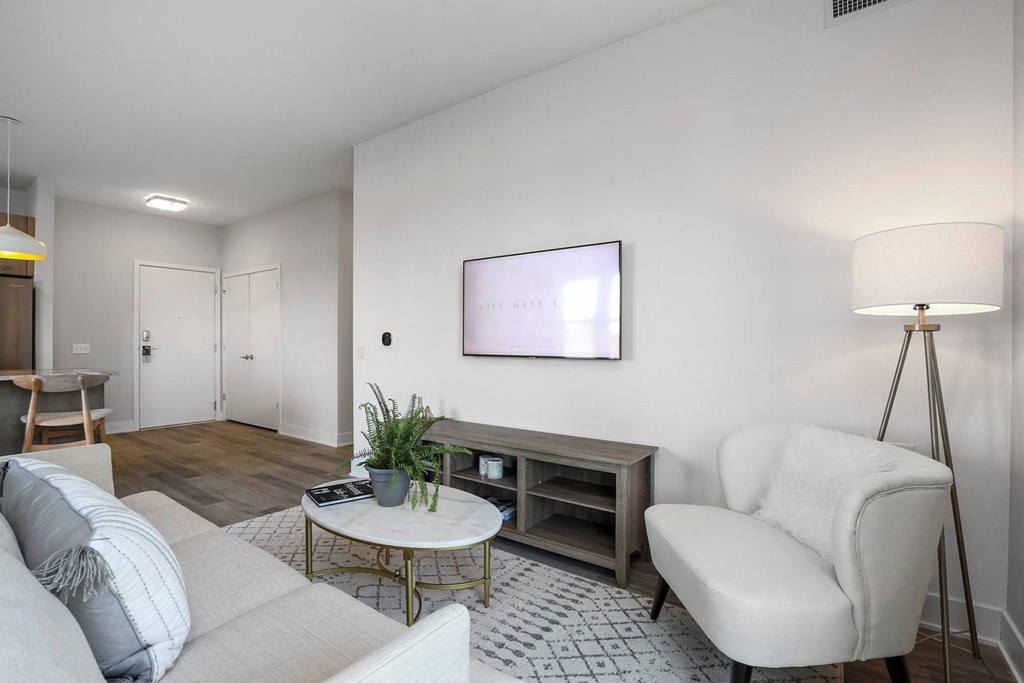 a living room with a couch and a table