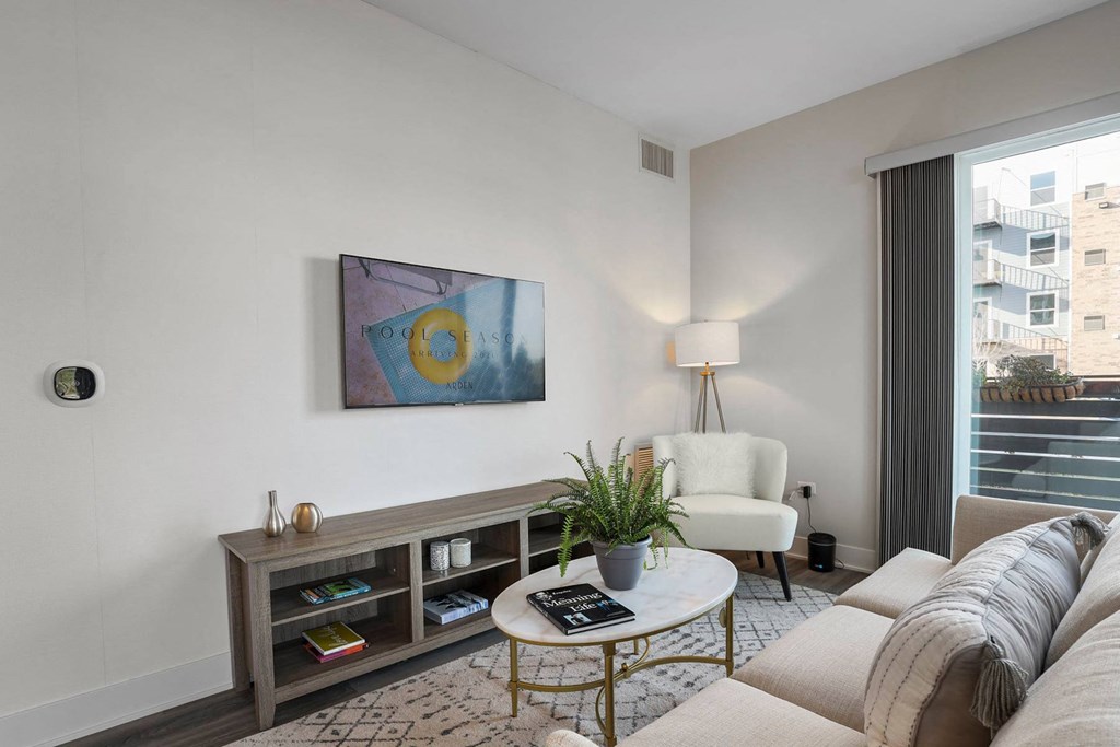 a living room with a couch and a table