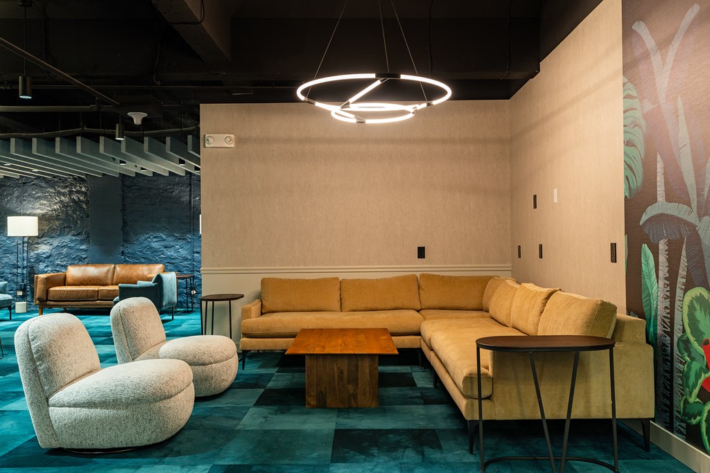 a living room with couches chairs and a table at Textile Apartments, Cincinnati, OH, 45202