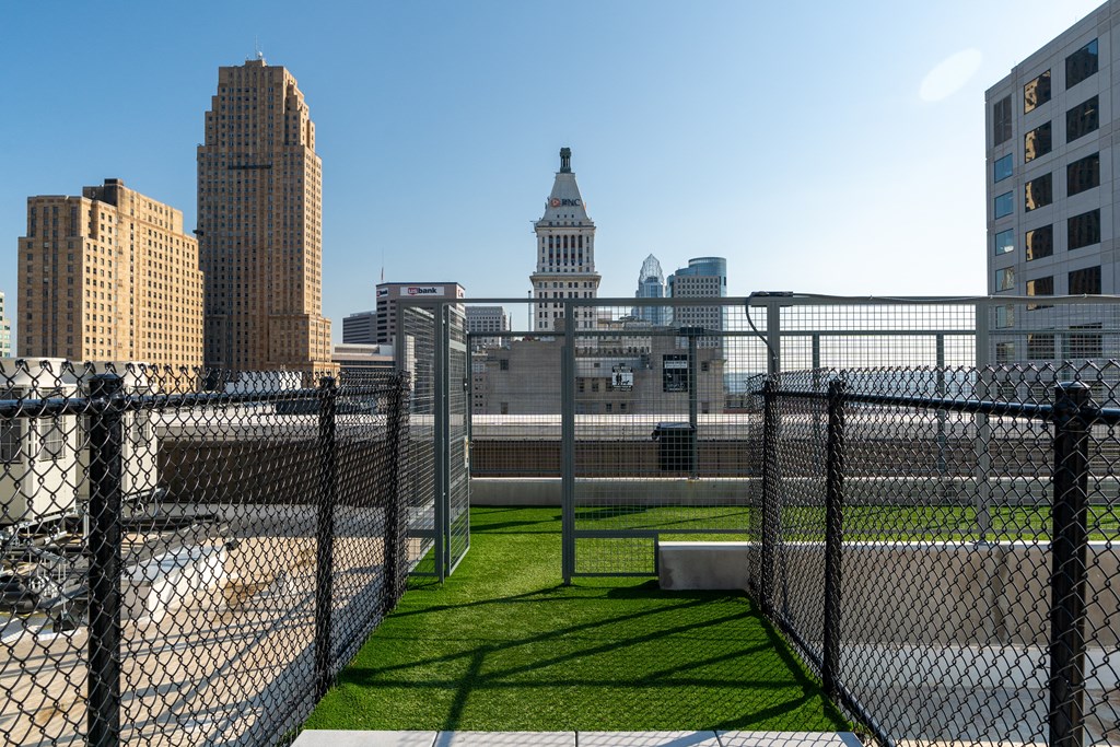 a view of the city from the top of a fenced in field at Textile Apartments, Ohio