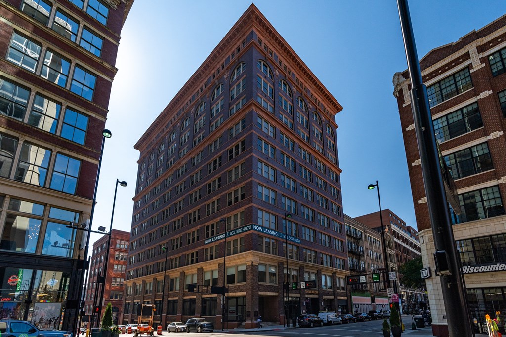 a tall brick building on a city street at Textile Apartments, Cincinnati, OH, 45202