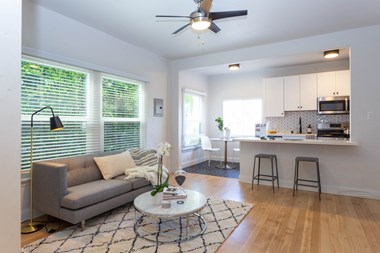 Kitchen opening up into living area