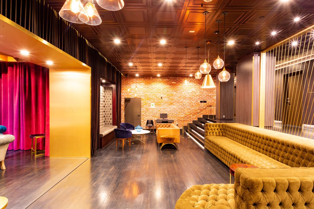 Indoor lounge space decorated to give off the feel of a swanky old hotel