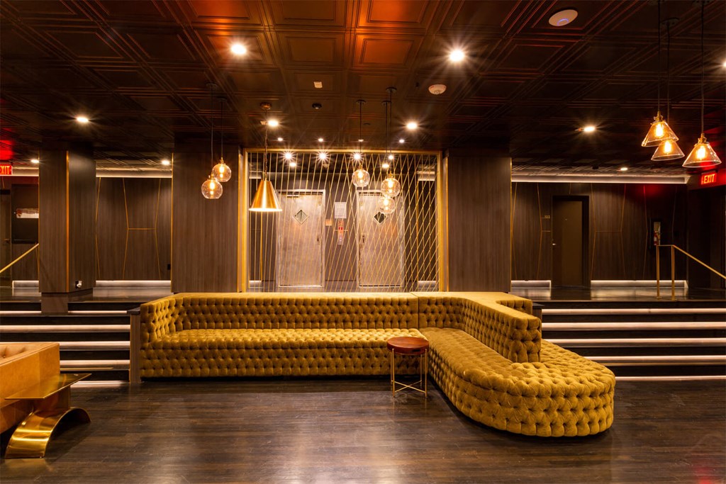 Beautifully designed lobby and lounge space with all wooden walls and flooring