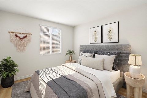 Spacious bedroom with beautiful decorative pieces and full sized bed