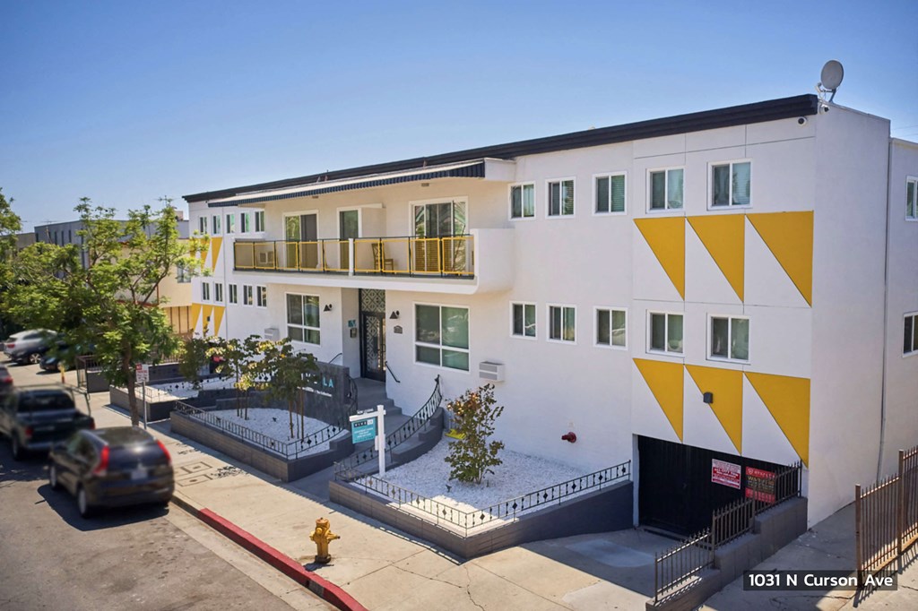 Exterior of Chloe on Curson with patios and car garage