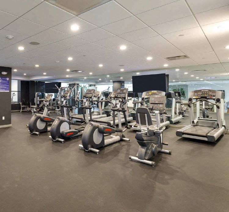 Fitness Center with Cardio Machines, Free Weights, and a TV