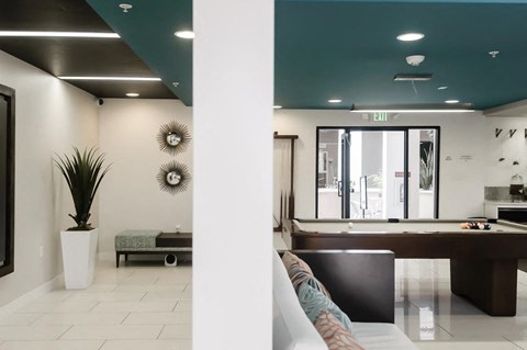 Spacious indoor clubhouse with pool table