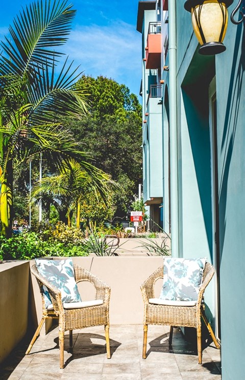 Exterior wall of building with chairs