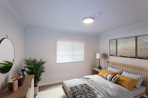 a bedroom with a bed and a dresser and a window