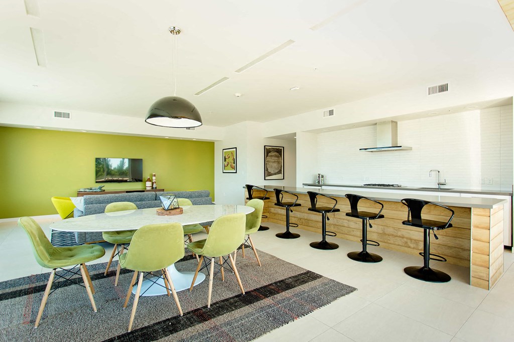 Rooftop indoor clubhouse tastefully decorated for a comfortable hang-out feel