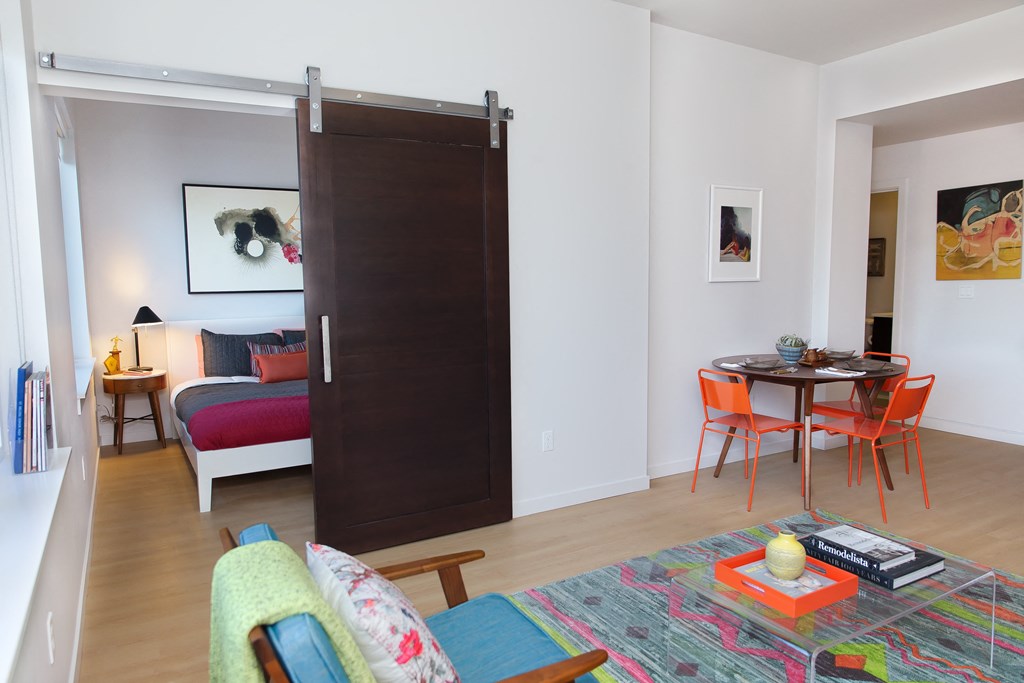 Unit with bedroom, living area, kitchen, and bathroom