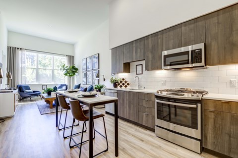 Living area Open spacious floor plans with kitchen, dining area, and living room area